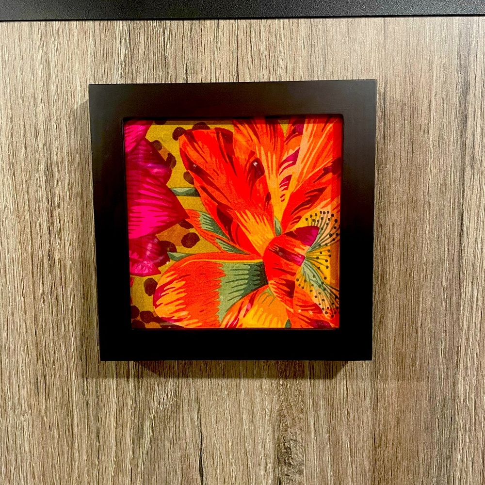 Beautiful floral textile wall or tabletop decor.
